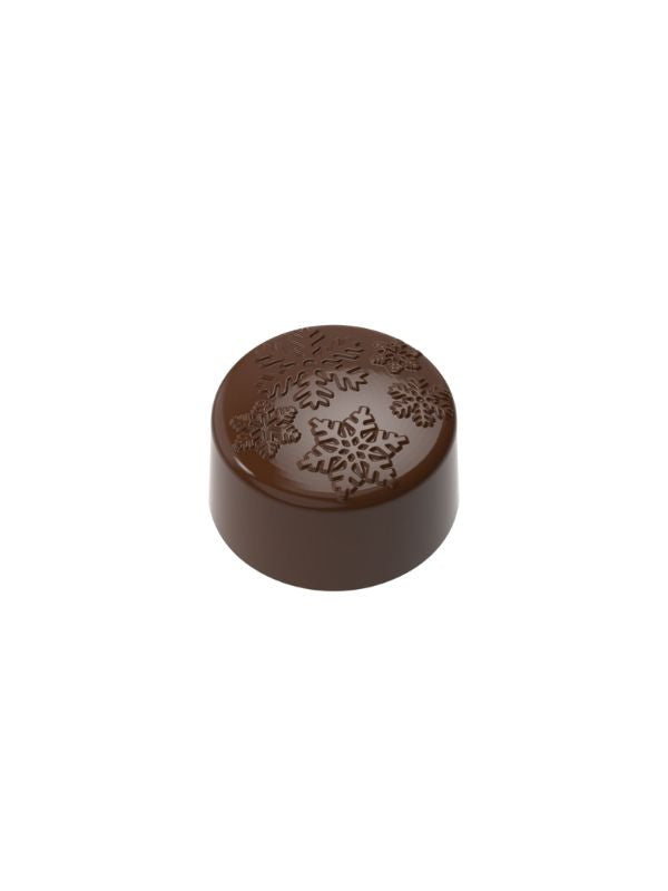 polycarbonate snowflake chocolate mold, snowflake praline chocolate mold, winter chocolate mould, Christmas chocolate mold, holiday chocolate mold, snowflake bonbon mold, round praline chocolate mold, embossed snowflake chocolate mold, festive chocolate mould, seasonal chocolate mold, winter themed chocolate mold, decorative chocolate mold, professional polycarbonate chocolate mold, artisan chocolate mold, confectionery chocolate mold, chocolate casting mold, reusable chocolate mold, rigid chocolate mould