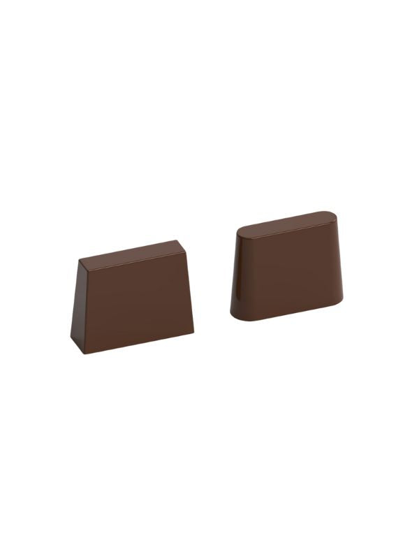 polycarbonate trapezoid chocolate mold, trapezoid praline chocolate mold, rectangular praline chocolate mold, rounded rectangle chocolate mould, beveled chocolate mold, tapered chocolate mold, geometric bonbon mold, smooth praline chocolate mold, modern chocolate mould, filled chocolate mold, professional polycarbonate chocolate mold, artisan chocolate mold, confectionery chocolate mold, chocolate casting mold, reusable chocolate mold, rigid chocolate mould, minimalist praline mold