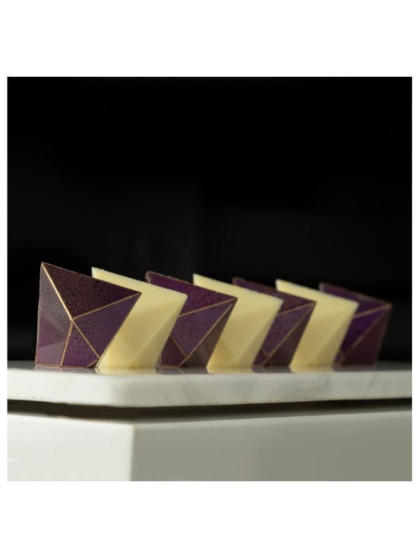 polycarbonate pyramid chocolate mold, pyramid praline chocolate mold, geometric chocolate mould, faceted chocolate mold, 3D pyramid chocolate mold, angular chocolate mould, gemstone chocolate mold, diamond style chocolate mold, pyramid bonbon mold, modern praline chocolate mold, decorative chocolate mold, professional polycarbonate chocolate mold, filled chocolate mold, artisan chocolate mold, confectionery chocolate mold, chocolate casting mold, reusable chocolate mold, rigid chocolate mould
